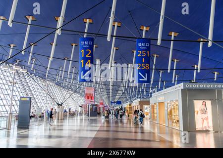 Shanghai, China - April 1, 2024: Shanghai Pudong Airport (PVG) Terminal 1 in Shanghai, China. Stock Photo