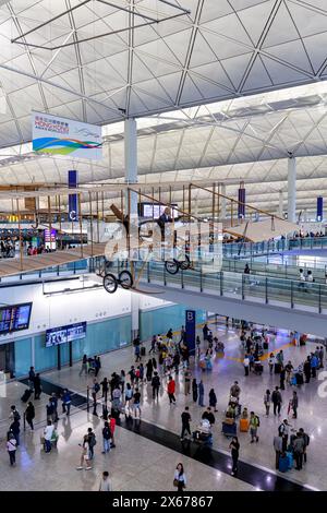Hong Kong, China - April 6, 2024: Terminal of Chek Lap Kok Airport in Hong Kong, China. Stock Photo
