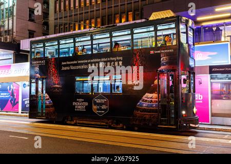 Hong Kong, China - April 6, 2024: Hong Kong Tramway double-decker tram public transport at Pedder Street Station in Hong Kong, China. Stock Photo