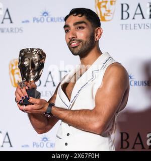 London, UK. 12th May, 2024. Mawaan Rizwan poses with the BAFTA for Male Comedy Performance photographed backstage in the press room BAFTA TV Awards with P&O Cruises 2024. Picture by Julie Edwards./Alamy Live News Stock Photo