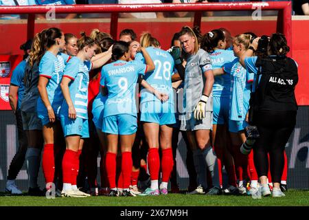 Bridgeview, Illinois, USA. 12th May, 2024. Chicago Red Stars huddle during NWSL Soccer match action between the Utah Royals FC and Chicago Red Stars at SeatGeek Stadium in Bridgeview, Illinois. John Mersits/CSM/Alamy Live News Stock Photo