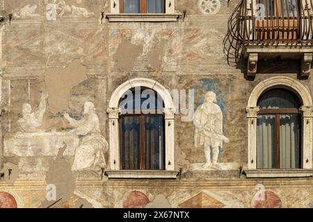 The painted facade of the Case Cazuffi Rella houses on Piazza del Duomo in Trento, Trentino, Italy, Europe Stock Photo
