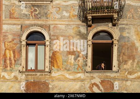 The painted facade of the Case Cazuffi Rella houses on Piazza del Duomo in Trento, Trentino, Italy, Europe Stock Photo