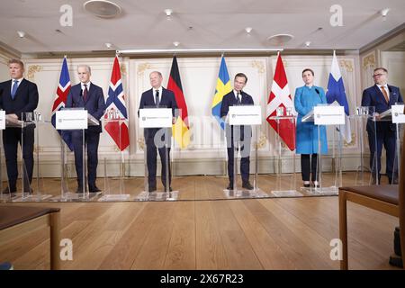 Stockholm, Sweden. 13th May, 2024. STOCKHOLM, SWEDEN 20240513(L-R) Iceland's Prime Minister Bjarni Benediktsson, Norway's Prime Minister Jonas Gahr Støre, Germany's Chancellor Olaf Scholz, Sweden's Prime Minister Ulf Kristersson, Denmark's Prime Minister Mette Frederiksen and Finland's Prime Minister Petteri Orpo hold a joint news conference on Skeppsholmen in Stockholm, Sweden, May 13, 2024, during a two day long Nordic meeting of prime ministers, on security and competitiveness. Photo: Christine Olsson/TT/Code 10430 Credit: TT News Agency/Alamy Live News Stock Photo