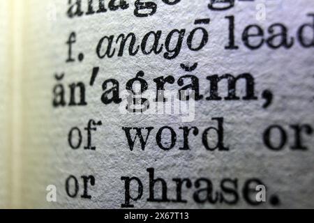 Word anagram on dictionary page, macro close-up Stock Photo
