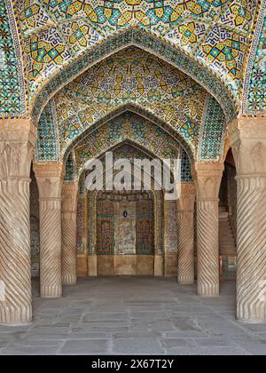 Mihrab (a niche in the wall indicating the direction of Mecca) in the main prayer hall of the 18th century Vakil Mosque. Shiraz, Iran. Stock Photo