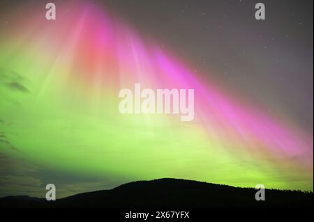 Northern Lights over the Yaak Valley on May 10, 2024. Lincoln County, northwest Montana. (Photo by Randy Beacham) Stock Photo