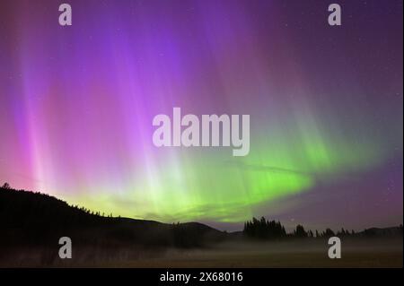 Northern Lights over the Yaak Valley on May 11, 2024. Lincoln County, northwest Montana. (Photo by Randy Beacham) Stock Photo