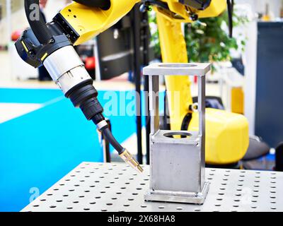 Robotic welding machine at the exhibition Stock Photo