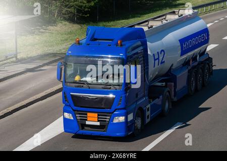 Truck with hydrogen tank trailer. Hydrogen transportation concept Stock Photo