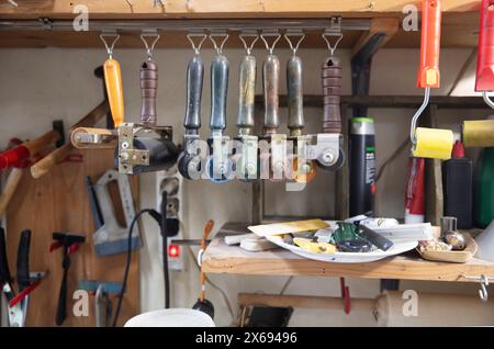 Artist studio, workshop, artist tools, paints, rollers Stock Photo