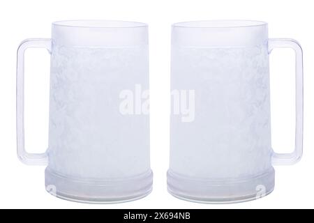 Two empty beer mugs with ergonomic handle isolated on white background with copy space Stock Photo