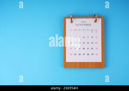 November 2024 calendar on blue background Stock Photo