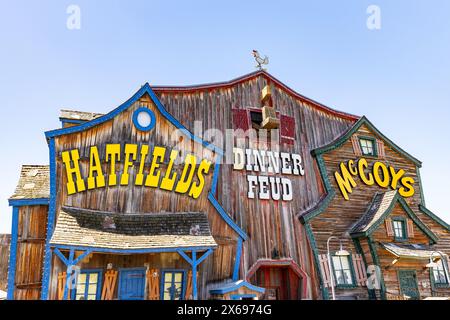 The Hatfield and McCoy Dinner Feud is an entertaining dinner show for family with music, dancing, and comedy. Stock Photo