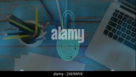 Laptop and school supplies are on wooden table Stock Photo