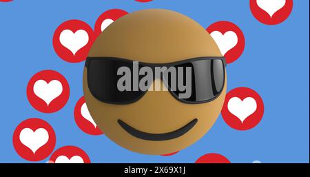 Face wearing sunglasses emoji over multiple red heart icons floating against blue background Stock Photo