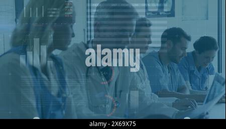 Image of data processing over diverse group of doctors Stock Photo