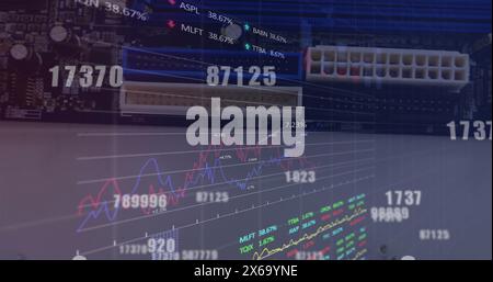 Image of changing numbers and stock market data processing against close up of a circuit board Stock Photo