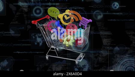 Image of digital icons in shopping trolley over screens on black background Stock Photo