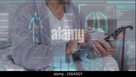 African American senior woman in lab coat reviews digital health data Stock Photo