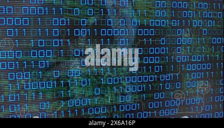 Composition of binary coding processing over purple background Stock Photo