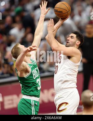 Cleveland, United States. 13th May, 2024. Cleveland Cavalier's Georges Niang (20) shoots over Boston Celtics Sam Hauser (3 in the first half of the Eastern Conference semi finals game 4 at Rocket Mortgage Fieldhouse in Cleveland, Ohio on Monday, May, 13, 2024. Photo by Aaron Josefczyk/UPI Credit: UPI/Alamy Live News Stock Photo