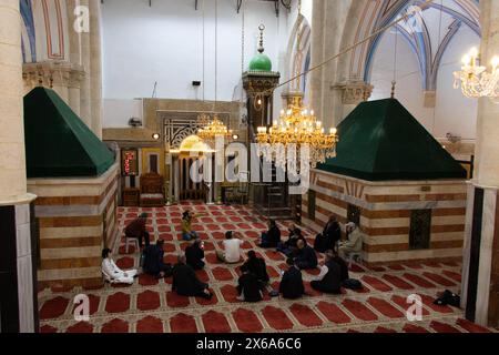 Muslim pilgrims in the Cave of Patriarchs in Khalil or Hebron city of Palestine - April 21, 2022. Stock Photo