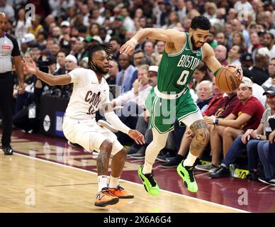 Cleveland, United States. 13th May, 2024. Boston Celtics Jayson Tatum (11) is fouled by Cleveland Cavaliers Darius Garland (1) in the second half of the Eastern Conference semi finals game 4 at Rocket Mortgage Fieldhouse in Cleveland, Ohio on Monday, May, 13, 2024. Photo by Aaron Josefczyk/UPI Credit: UPI/Alamy Live News Stock Photo