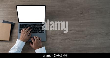 Close up of man hands computer blank screen Mockup device screen template Stock Photo
