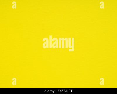 Bright yellow matte detail wrapping paper texture. Stock Photo