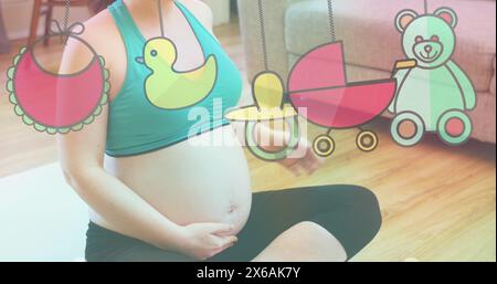 Image of toys icons over caucasian pregnant woman exercising at home Stock Photo