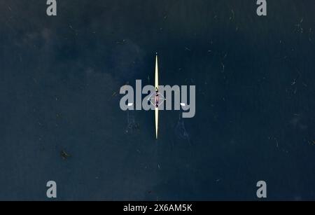 Aerial view of lone rower on Albert Park Lake in Melbourne Australia. Stock Photo