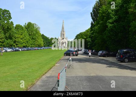 Koninklijke Serres van Laken, Brussels, Belgium - May 12, 2024: Parked cars in front of Monument to the Dynasty on a sunny Sunday Stock Photo