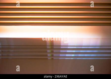 Detailed close-up of a modern white metal heater, showcasing its sleek design and efficient heating technology. Stock Photo