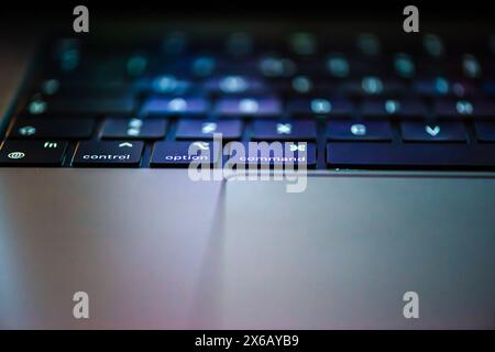 Detailed close-up of laptop keys, highlighting their sleek design and responsive typing experience. Stock Photo
