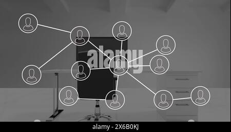 Image of network of connections with icons over office desk with computer Stock Photo