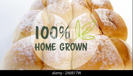 Image of home grown text banner against close up of fresh bread on