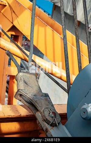 about the box sheave hook block and sling reeving pulley rustly at the tower crane hoist boom by emphasizing at sheave reeving box Stock Photo