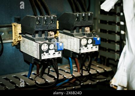 the overload switch for the control system in an elevator affects the contractor and it can be made rotount motor. Stock Photo