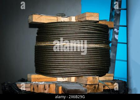 Hand tools for maintenance works. there is a sling drum hoist of the motor that is just stocking for repair work. Stock Photo