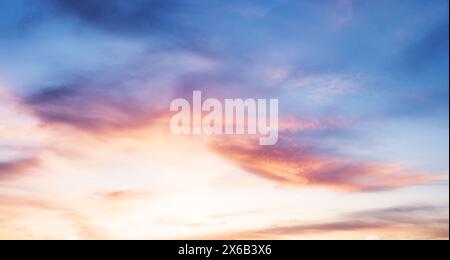 Pink - blue sky at sunset with clouds Stock Photo