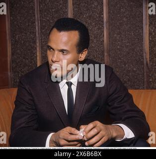 Harry Belafonte (born Harold George Bellanfanti Jr.; March 1, 1927 – April 25, 2023) was an American singer, actor, and civil rights activist who popularized calypso music with international audiences in the 1950s and 1960s. Belafonte's career breakthrough album Calypso (1956) was the first million-selling LP by a single artist. Pictured at Lake Tahoe USA 1963. Roland Palm ref 5-36-4 Stock Photo