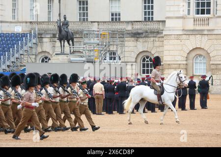 London, United Kingdom. 14th May, 2024. Rehearsals for Trooping of the Colour taking place at the Horse Guards Parade. Trooping the colour ceremony will take place on 15 June by regiments of the household division to celebrate the King's official birthday. Credit: Uwe Deffner/Alamy Live News Stock Photo