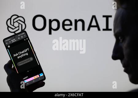 Brussels, Belgium. 13th May, 2024. The OpenAi web page is displayed on a smartphone with OpenAi logo visible in the background in this photo illustration. Taken in Brussels, Belgium. On May 13, 2024. (Jonathan Raa/Sipa USA) *** Strictly for editorial news purposes only *** Credit: Sipa USA/Ģ����ý Live News Stock Photo