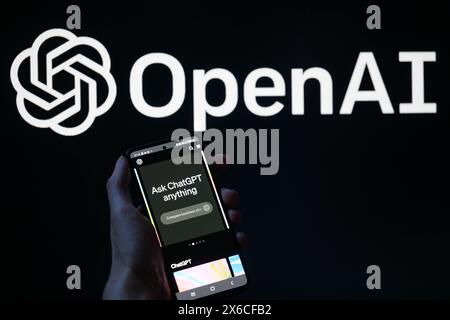 Brussels, Belgium. 13th May, 2024. OpenAi web page is displayed on a smartphone with OpenAi logo visible in the background in this photo illustration. Taken in Brussels, Belgium. On May 13, 2024. (Jonathan Raa/Sipa USA) *** Strictly for editorial news purposes only *** Credit: Sipa USA/Ģ����ý Live News Stock Photo