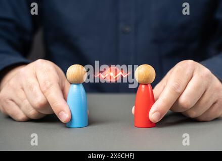 Conflict between people. Managed conflict and confrontation. Search for a compromise. Dispute resolution of opposing sides. Mediation of conflicting p Stock Photo