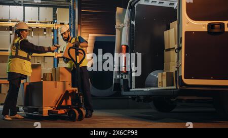 Outside of Logistics Retail Warehouse: Manager Using Tablet Computer and Scanner, talking to Worker Loading Delivery Truck with Cardboard Boxes, Online Orders, Medicine Supply, E-Commerce. Evening Stock Photo
