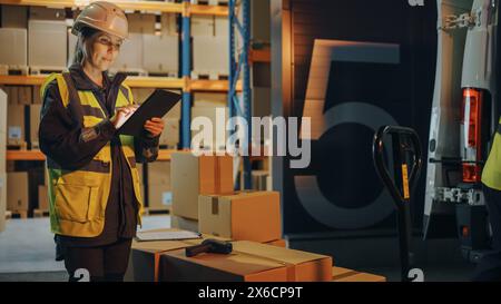 Outside of Logistics Retail Warehouse: Manager Using Tablet Computer to Check inventory. Worker Loading Delivery Truck with Cardboard Boxes, Online Orders, Medicine Supply, E-Commerce. Evening Stock Photo