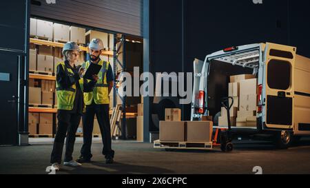Outside of Logistics Distributions Warehouse With Inventory Manager Using Tablet Computer, talking to Worker. Delivery Truck with Cardboard Boxes, Online Orders, E-Commerce Food and Medicine Supply Stock Photo