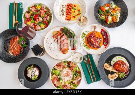 Meat dishes. Plates of various meat. Non vegetarian food banner. Top view. Stock Photo